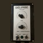 Double-adjustable control box for T11 road spreader. Regulates auger output and working width.